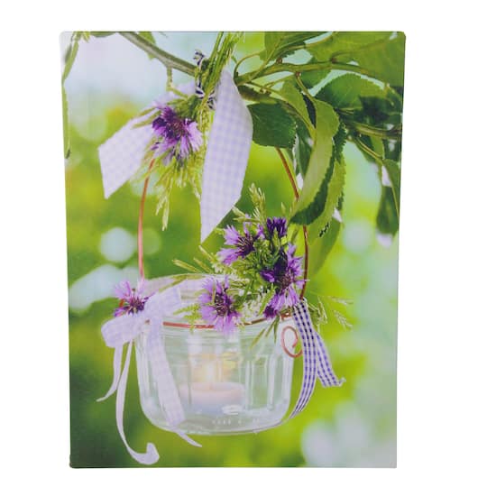 15.7" Lighted LED Tea Candle with Purple Flowers Canvas Wall Art By Northlight in Green/Purple | 15.75" x 11.75" | Michaels®
